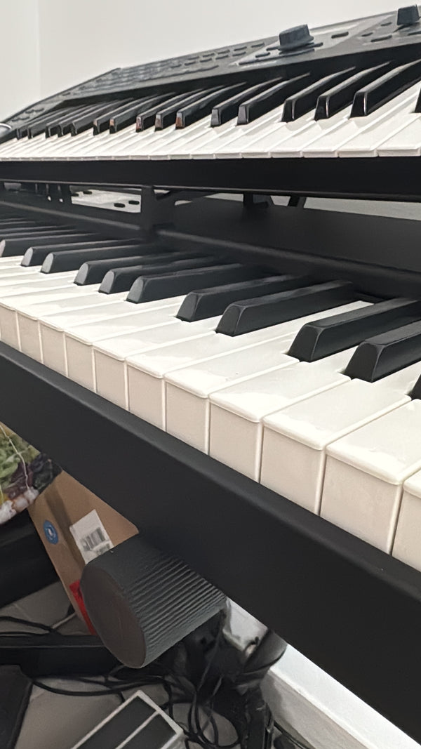 Adjustable holder for the Korg Kronos 2 iPad tablet